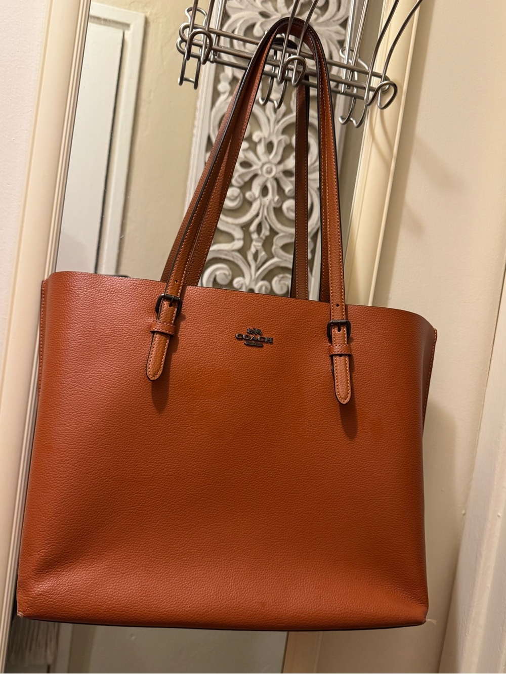 Coach Mollie Tote in a sunset-orange pebble leather